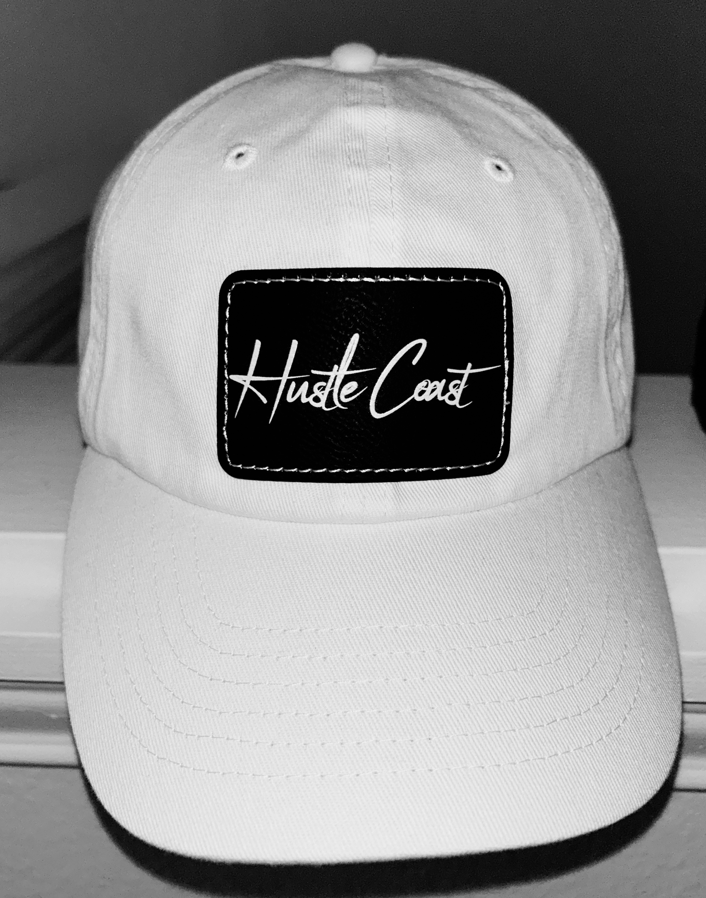 Hustle Coast on Black Leather Patch Dad Hat
